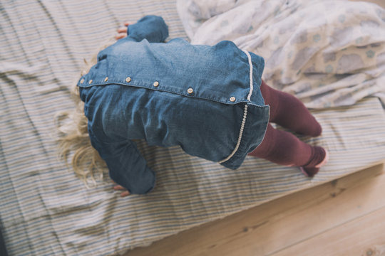 Little girl doing a sommersault