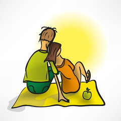 loving couple on a date sitting on the beach