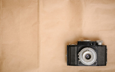 retro camera on paper background