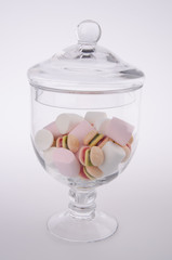 Candies. colorful candies in glass jar on background