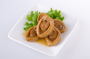 Abalones. Chinese cuisine abalone on background.