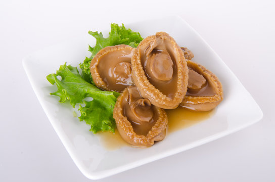 Abalones. Chinese cuisine abalone on background.