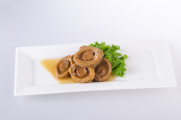Abalones. Chinese cuisine abalone on background.