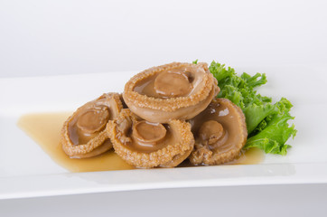 Abalones. Chinese cuisine abalone on background.