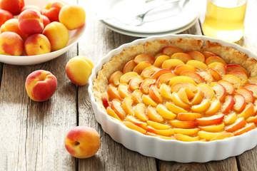Apricot pie on grey wooden background