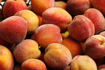 Ripe peach fruit background, close up