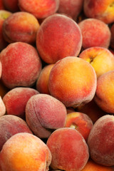 Ripe peach fruit background, close up