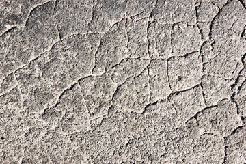 Cracked asphalt grunge texture.
