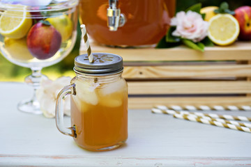 Peach cardamom lemonade with ice cubes