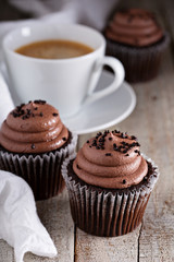 Chocolate cupcakes with a cup of coffee