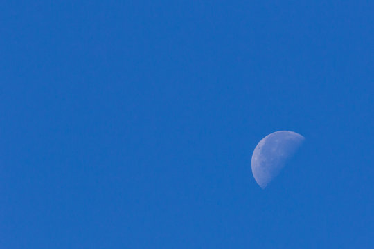 Half Moon in blue sky