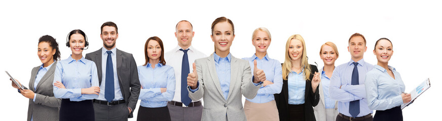 Fototapeta premium group of happy businesspeople showing thumbs up