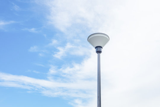 Street lamp and blue sky in the background