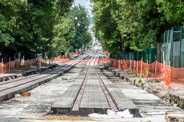 Fototapeta na wymiar Construction work on the construction of new roads and laying of tram rails in Lviv, Ukraine