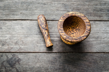 wood mortar on wood background