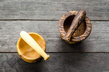 wood mortar on wood background