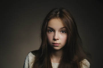 young beautiful girl studio portrait