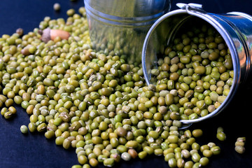 green beans dried on black background