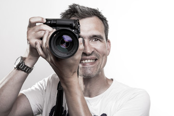 Fototapeta premium Lächelnder Fotograf