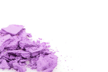 Crushed eyeshadows on white background