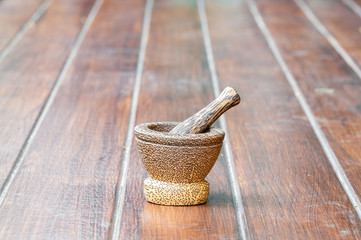 wood mortar on wood background