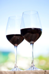 Two glasses with red wine, outside