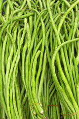Thai cuisine, green beans on a market stall