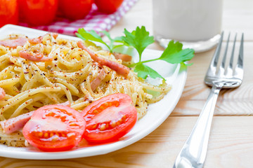 delicious pasta carbonara and beautiful table setting