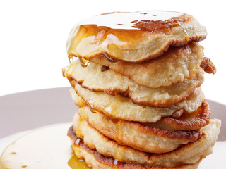 Stack of pancakes, syrup isolated on white background