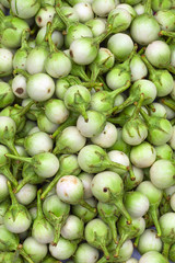 Thai cuisine, green eggplant on a market stall
