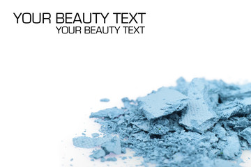 Crushed eyeshadows on white background