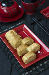 Japanese omelet tamago-yaki with black sesame seeds  