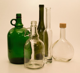 Green and white glass bottles