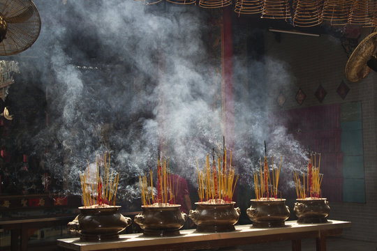 Incense smake fills the interior of a C inese temple.Chinatown,Ho Chi Mihn City (Saigon),Vietnam..