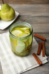 Pear juice with fresh fruits on table close up