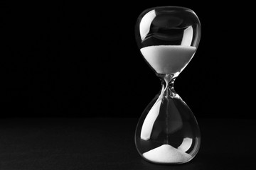 Hourglass on dark background