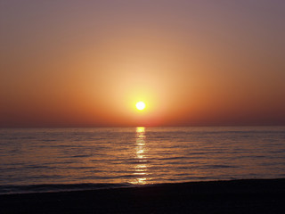 Bright red sea sunset