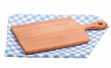 Cutting board isolated on blue  checkered tablecloth