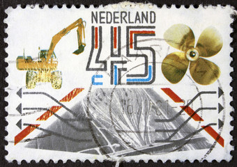 HOLLAND - CIRCA 1980: Stamp printed in the Netherlands shows an egg and some cheese, circa 1980 
