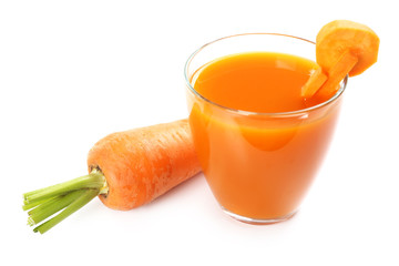 Glass of carrot juice with vegetable slices with vegetables isolated on white