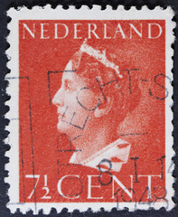 NETHERLANDS - CIRCA 1940: A stamp printed in Netherlands shows portrait of Queen Wilhelmina - Queen...