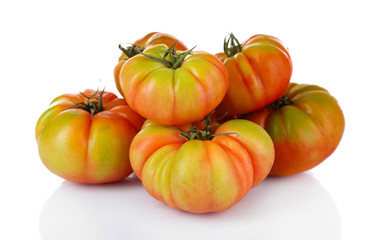 Fototapeta na wymiar Green tomatoes isolated on white
