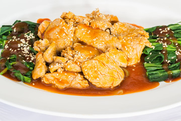 Stir fried pork topped with red wine sauce