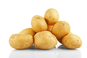 Young potatoes isolated on white