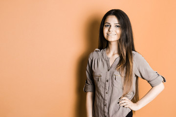 Beautiful young girl in the studio