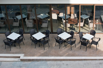 White cafe tables