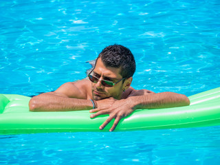 man relaxing on the air bed