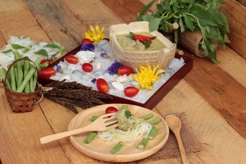 Green curry coconut milk with rice noodle.