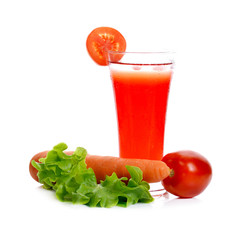 Glass of tomato juice and vegetable isolated on white
