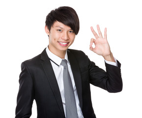 Asian businessman with ok sign gesture